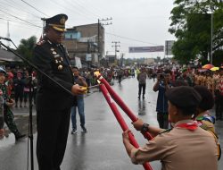 Kapolres Humbahas Lepas Taptu dan Pawai Obor  di Doloksanggul