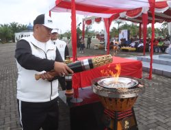 Kapolres Pimpin Upacara Kirab Api PON XXI Aceh-Sumut 2024, Disambut Meriah di Kabupaten Simalungun