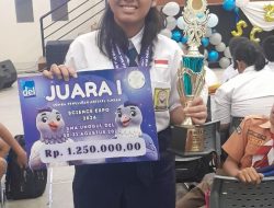 Apriani Sinambela Siswa SMPN 2 Doloksanggul, Juara I Lomba Artikel Ilmiah DEL