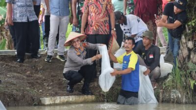 Kapolres Pematangsiantar Hadiri Pembagian Benih,Tebar Bibit Ikan dan Tanam Padi di Gunung Mulia