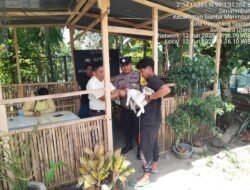 Vaksinasi Rabies Hewan Peliharaan Warga, Polsek Siantar Marihat Lakukan Pendampingan Penyuntikan