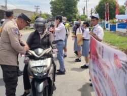 Polres Simalungun Semarakkan HUT RI ke-80, 2500 Bendera Merah Putih Dibagikan kepada Pengendara
