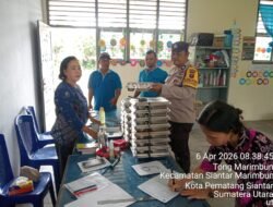 Kapolres Pematang Siantar Bagikan Kaporlap kepada Personil