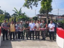 Bhabinkamtibmas Polsek Siantar Marihat Hadiri Peresmian Jembatan Garuda Merah Putih
