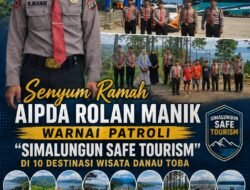 Senyum Ramah AIPDA Rolan Manik Warnai Patroli “Simalungun Safe Tourism” di 10 Destinasi Wisata Danau Toba