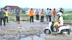 Air Sungai Meluap, Polsek Bosar Maligas Aksi Nyata Dampingi Masyarakat